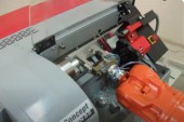 Sistem robotizat pentru alimentarea masinilor unelte